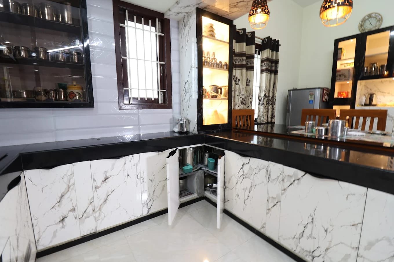 uPVC modular kitchen project on Perundurai Road, Erode by Jaya Interiors & Traders